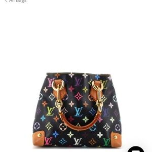 Original Louis Vuitton Audra Monogram with Dust bag and box. LIKE NEW